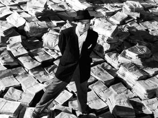 Orson Welles como Ch. F. Kane.